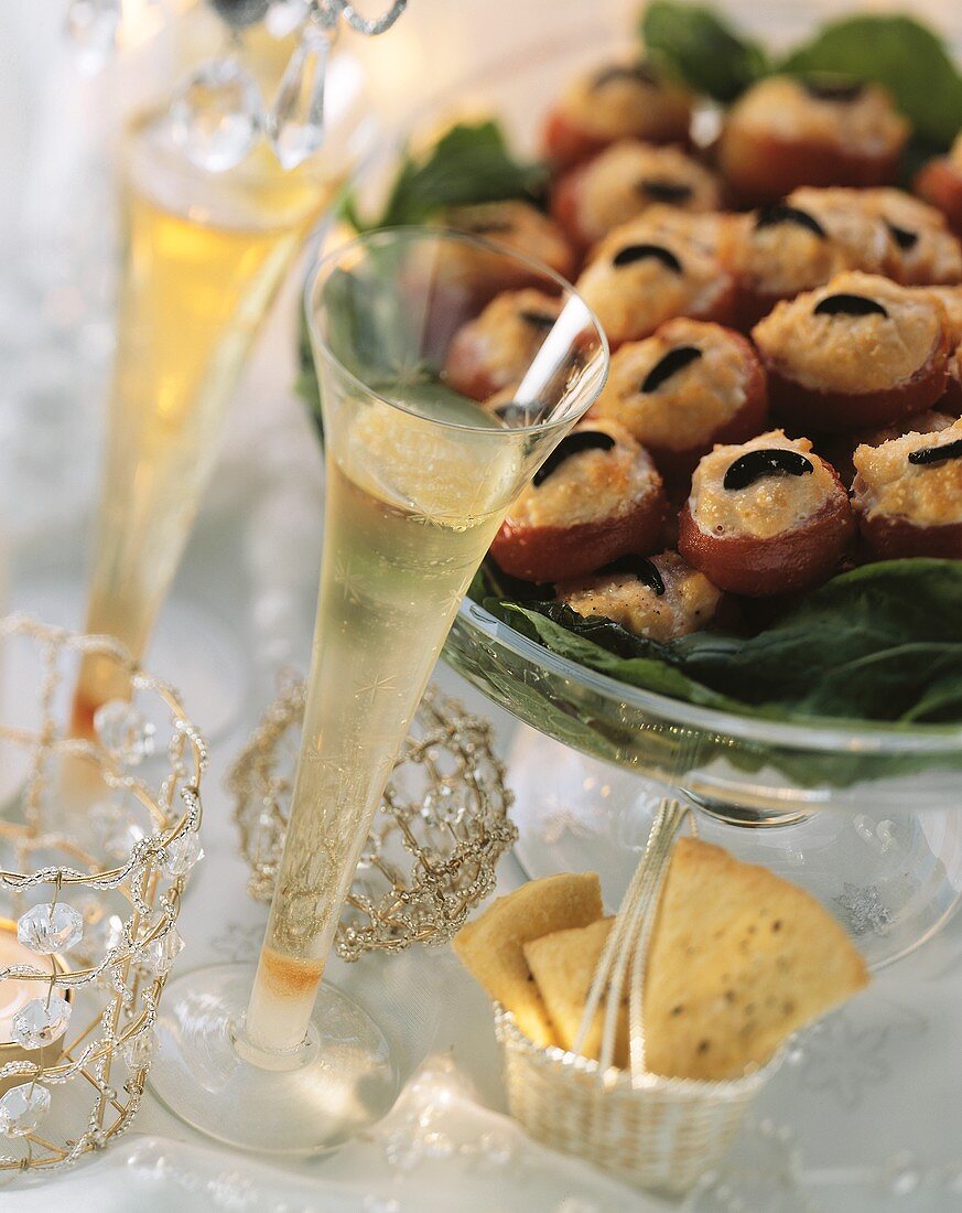 Champagne glasses & salmon-stuffed tomatoes for buffet
