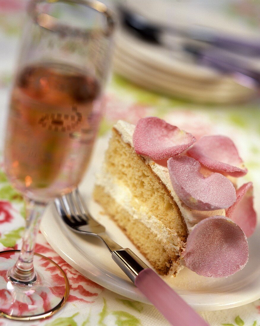 Sponge cake with rose mousse and sugared rose petals