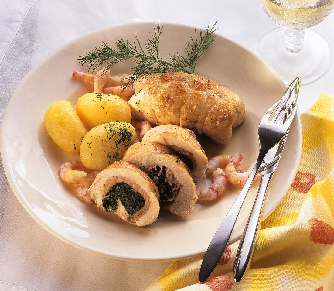 Turkey roulade filled with salmon & spinach, with shrimp sauce