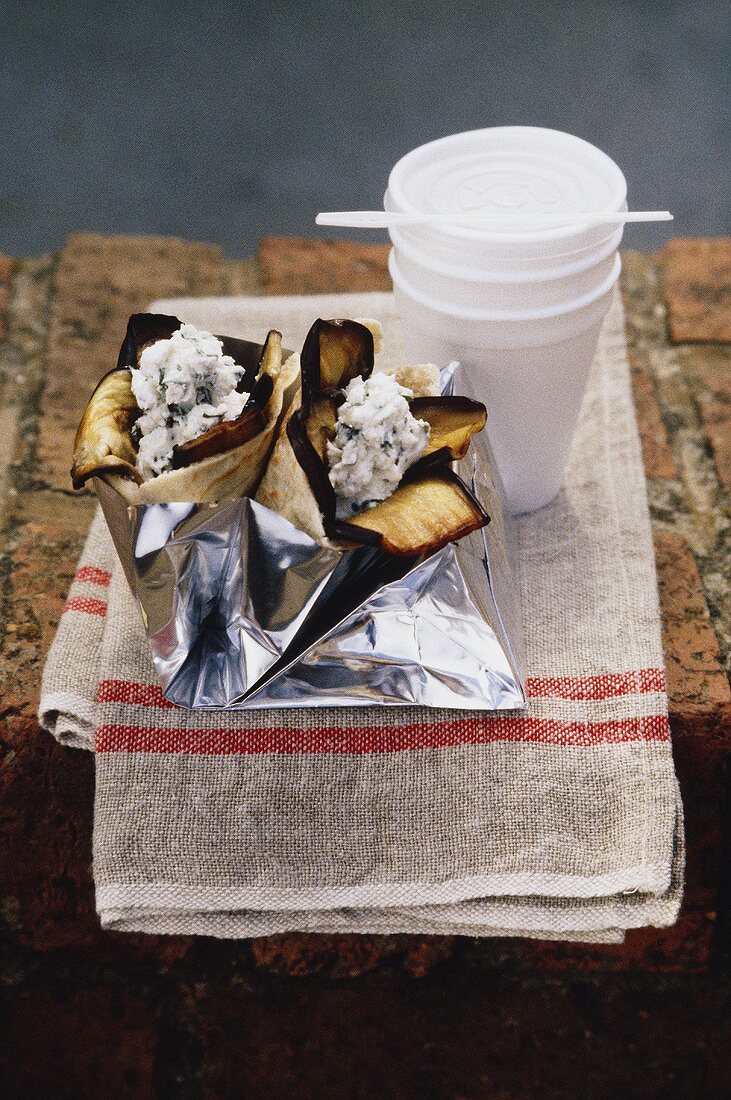 Pita pockets filled with aubergines and goat's cheese