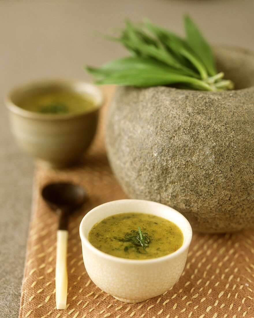 Cream of spinach soup in small bowl