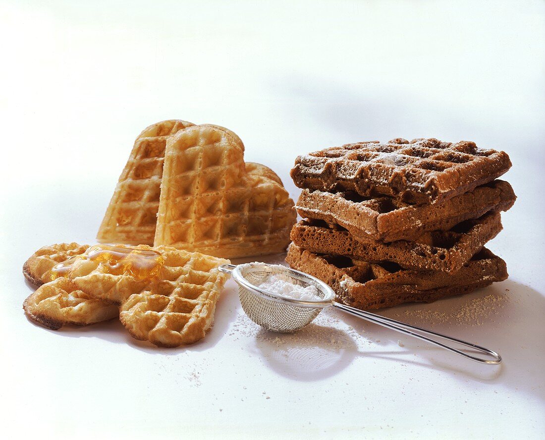 Waffles with icing sugar & chocolate waffles with almonds