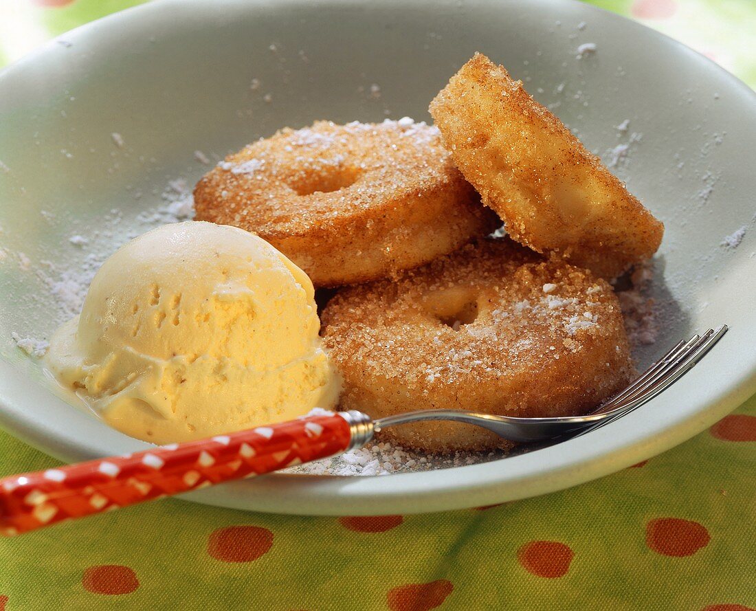 Cinnamon and apple fritters with vanilla ice cream