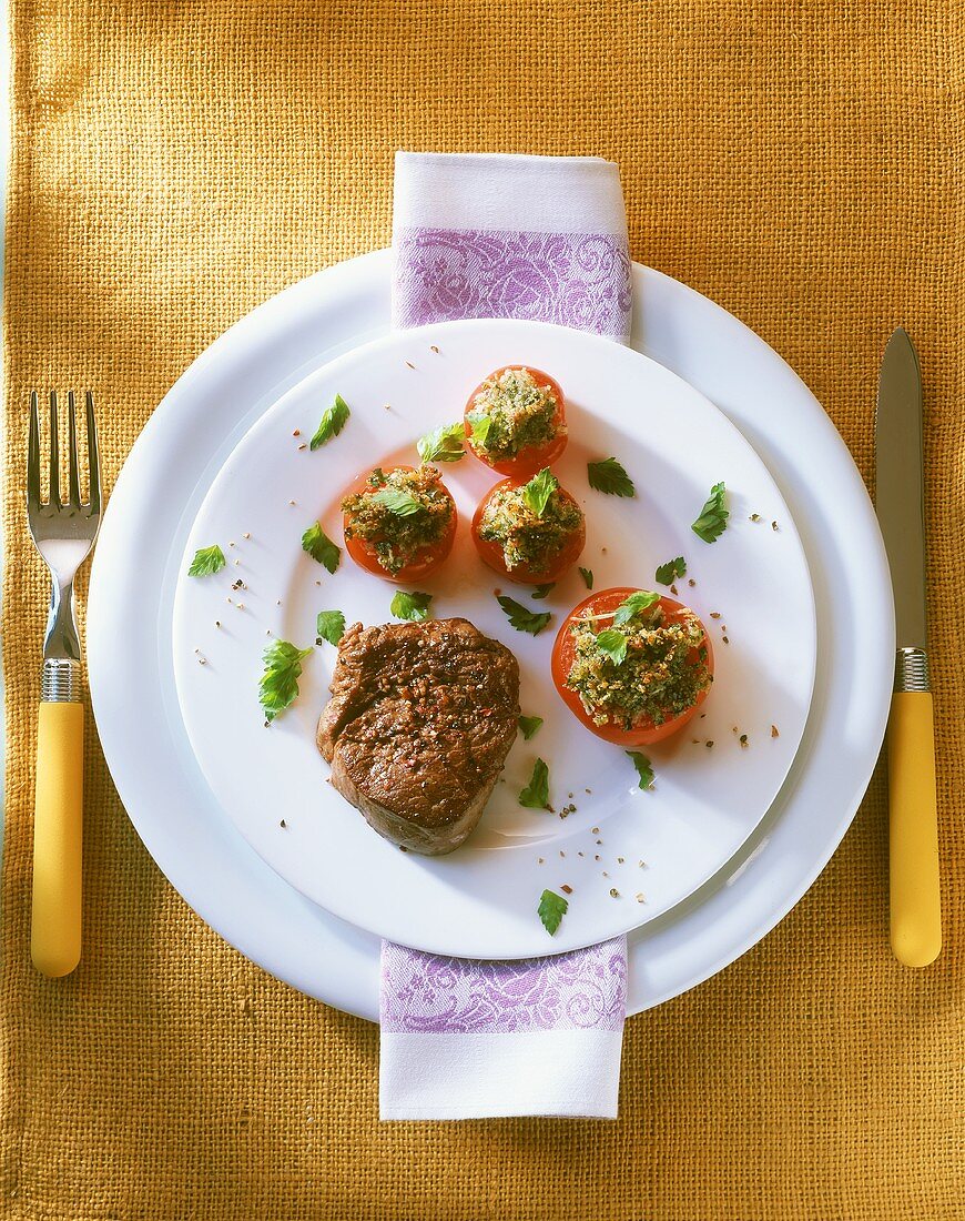 Fillet steak with stuffed tomatoes