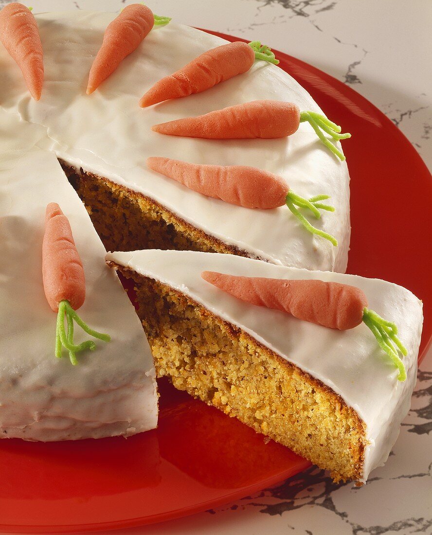 Iced carrot cake, a slice cut (Switzerland)