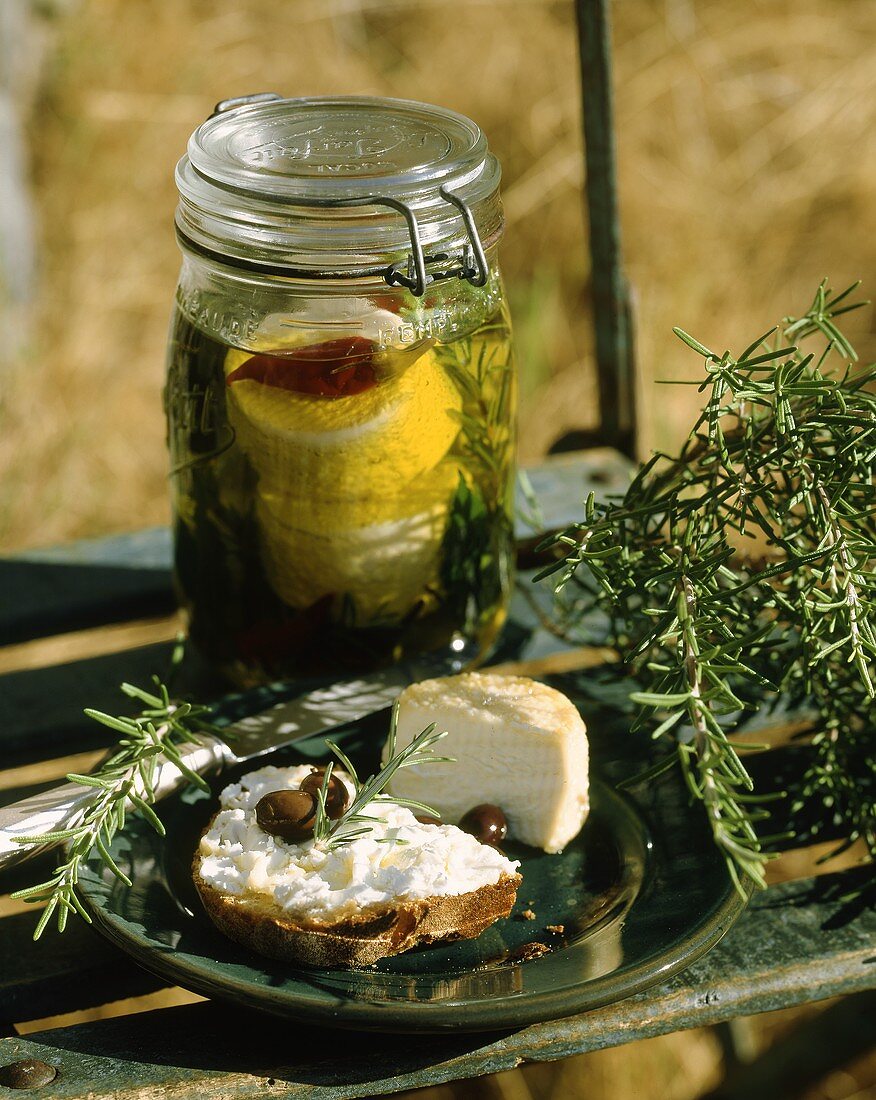 Goat's cheese in olive oil with herbs