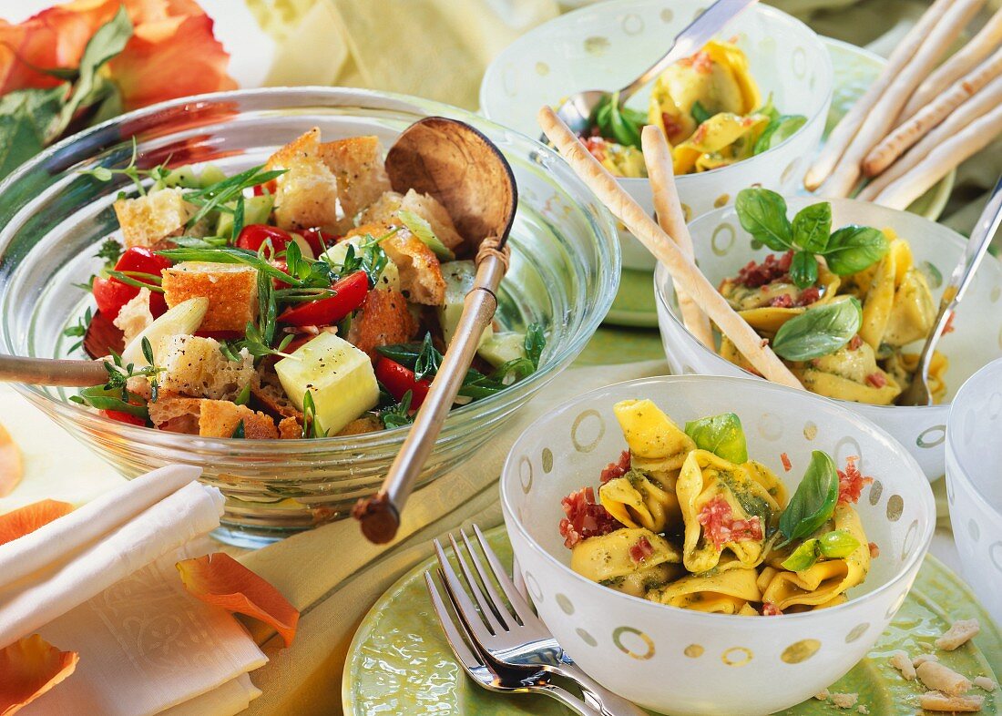 Bread & tortellini salads with salami, with grissini