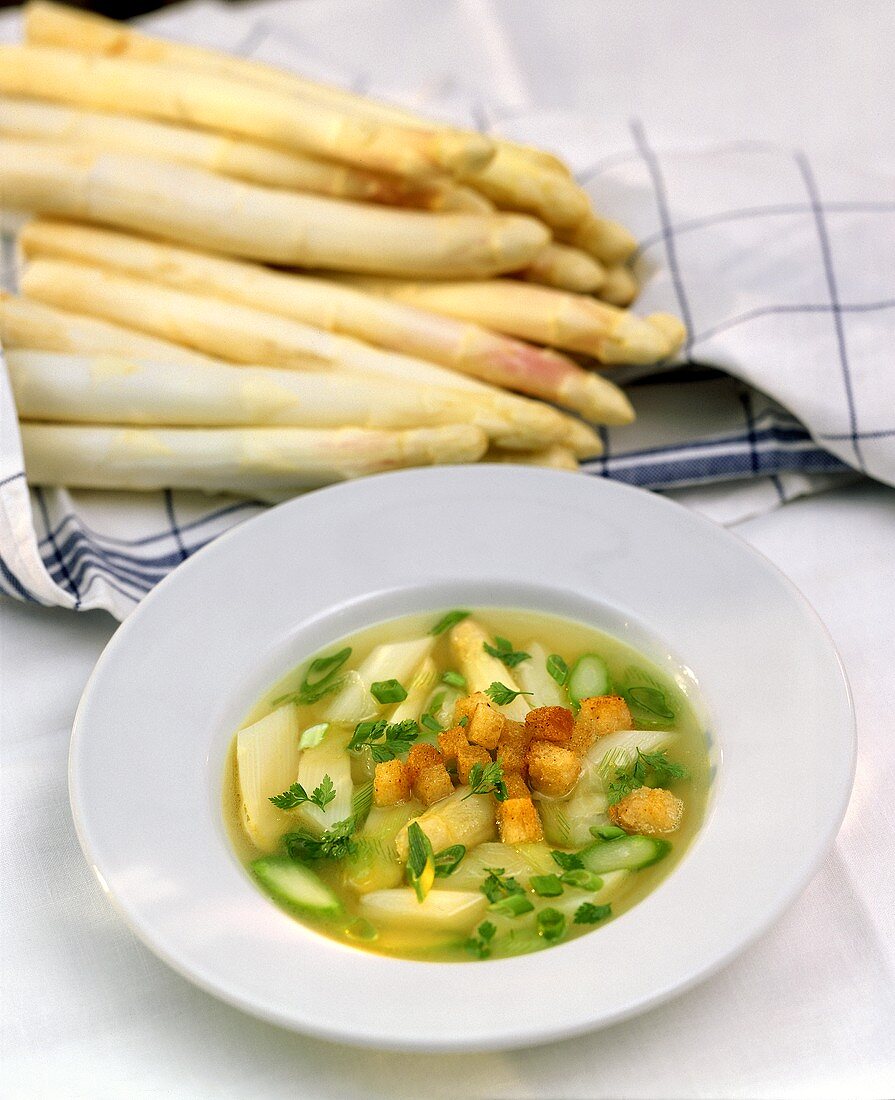 Asparagus soup with spring onions and croutons