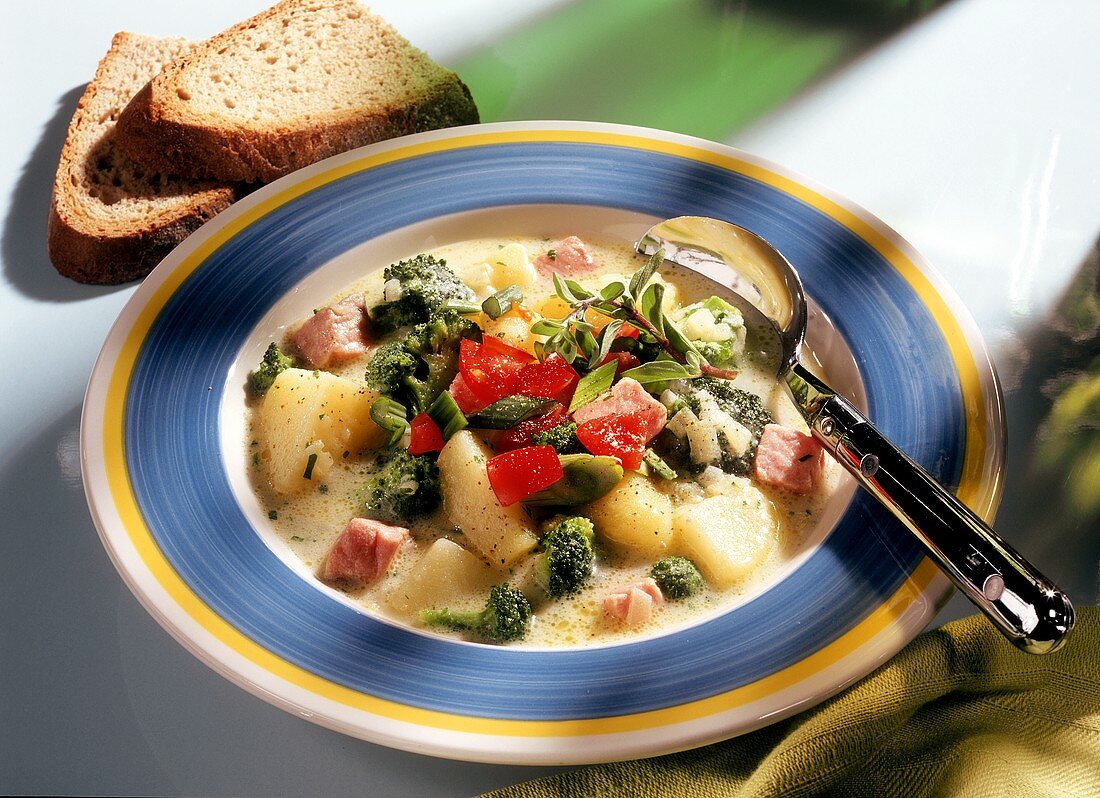 Potato and broccoli stew with salmon