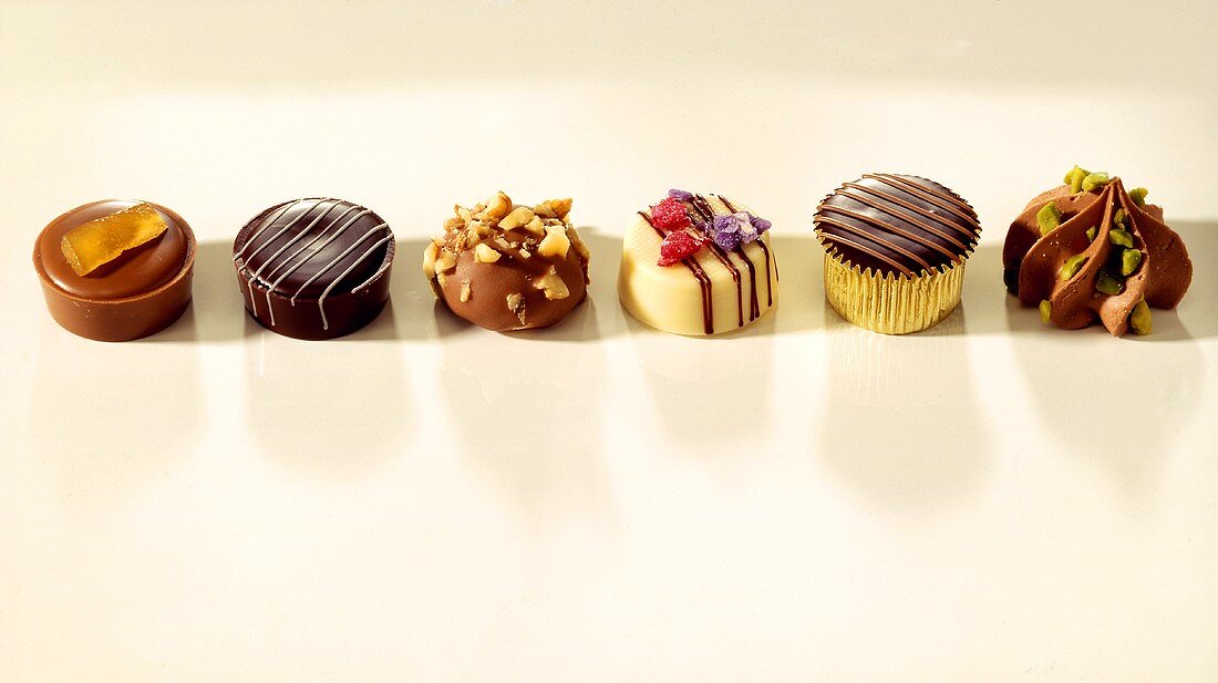 Assorted truffles in a row 