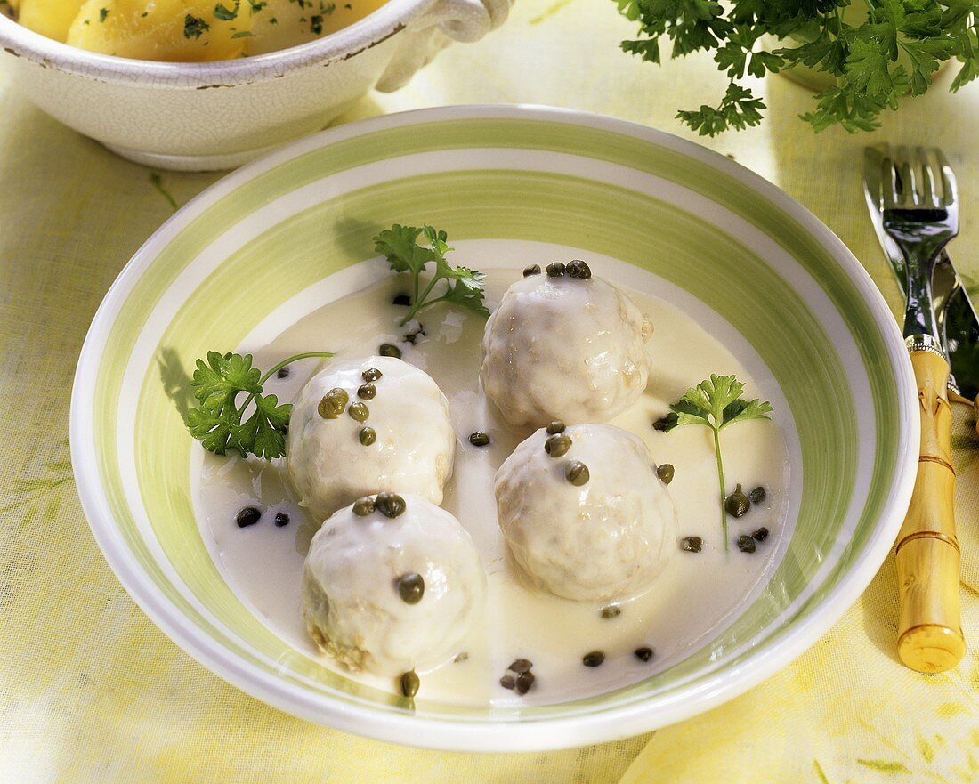 Königsberger meatballs, with parsley potatoes