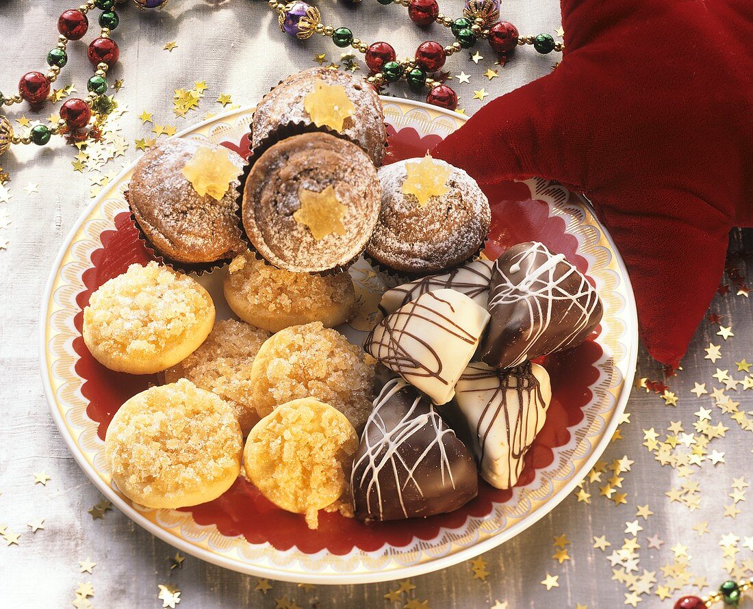 Christmas biscuits on plate, decoration: golden stars