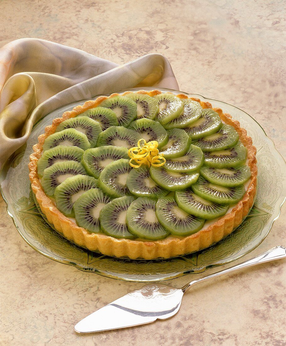 Kiwi tart on cake plate