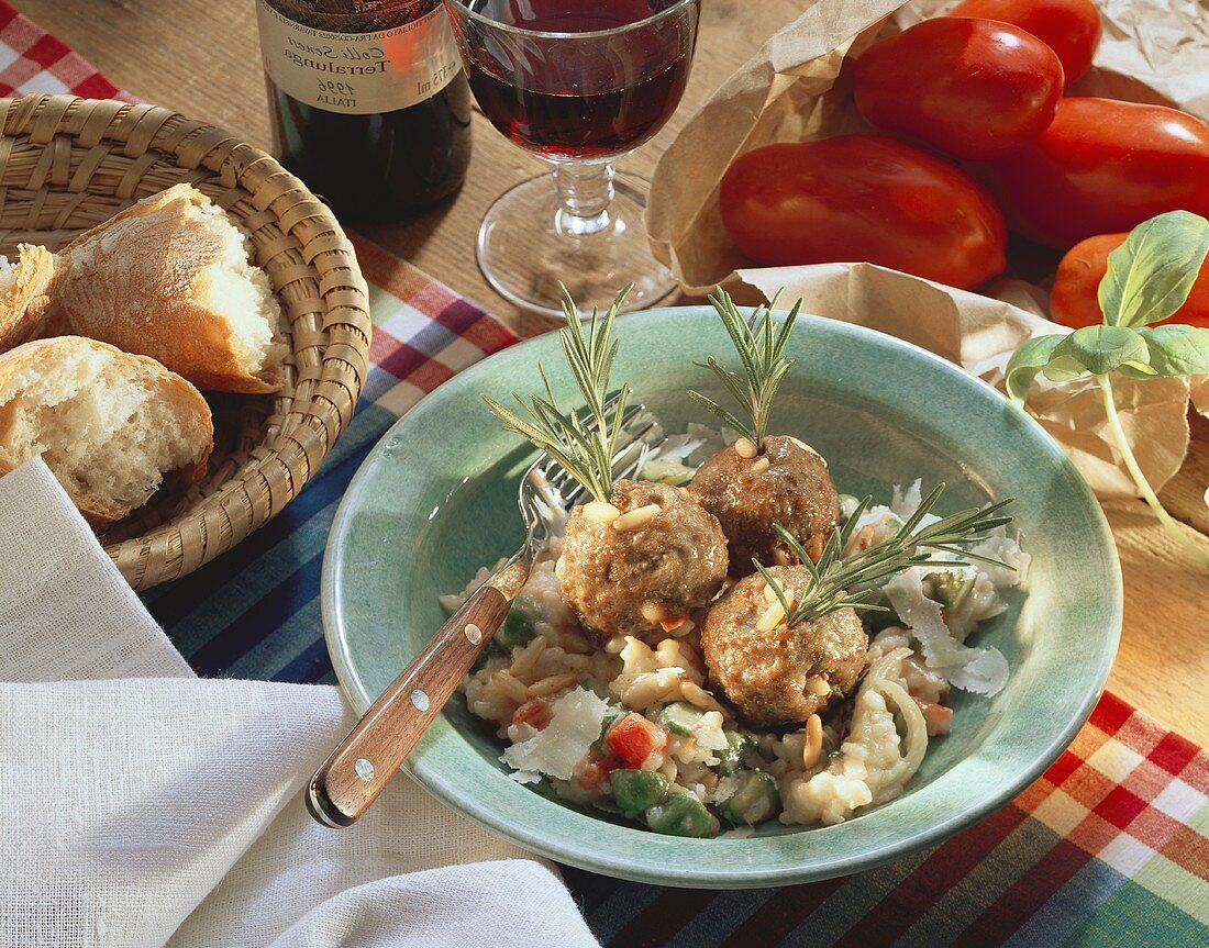 Meatballs with pine nuts and vegetable risotto