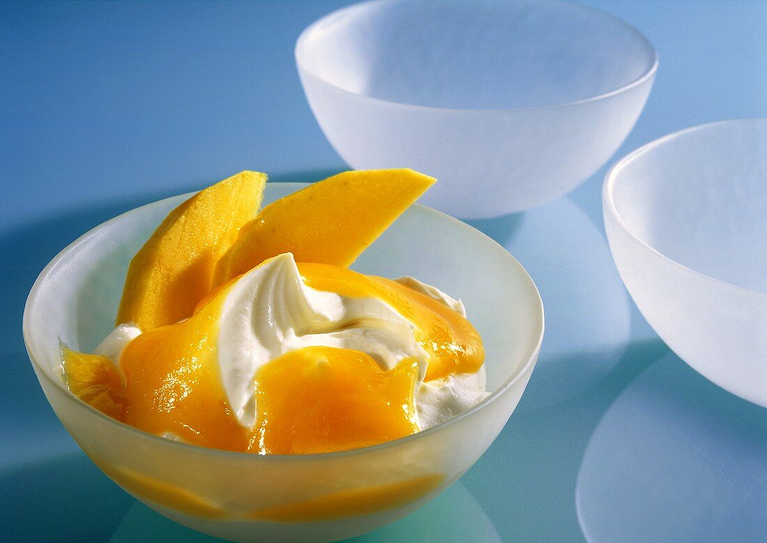 Mango mousse with mascarpone in small bowl