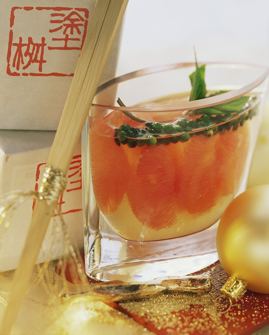 Pink grapefruits preserved in sake with pepper trusses