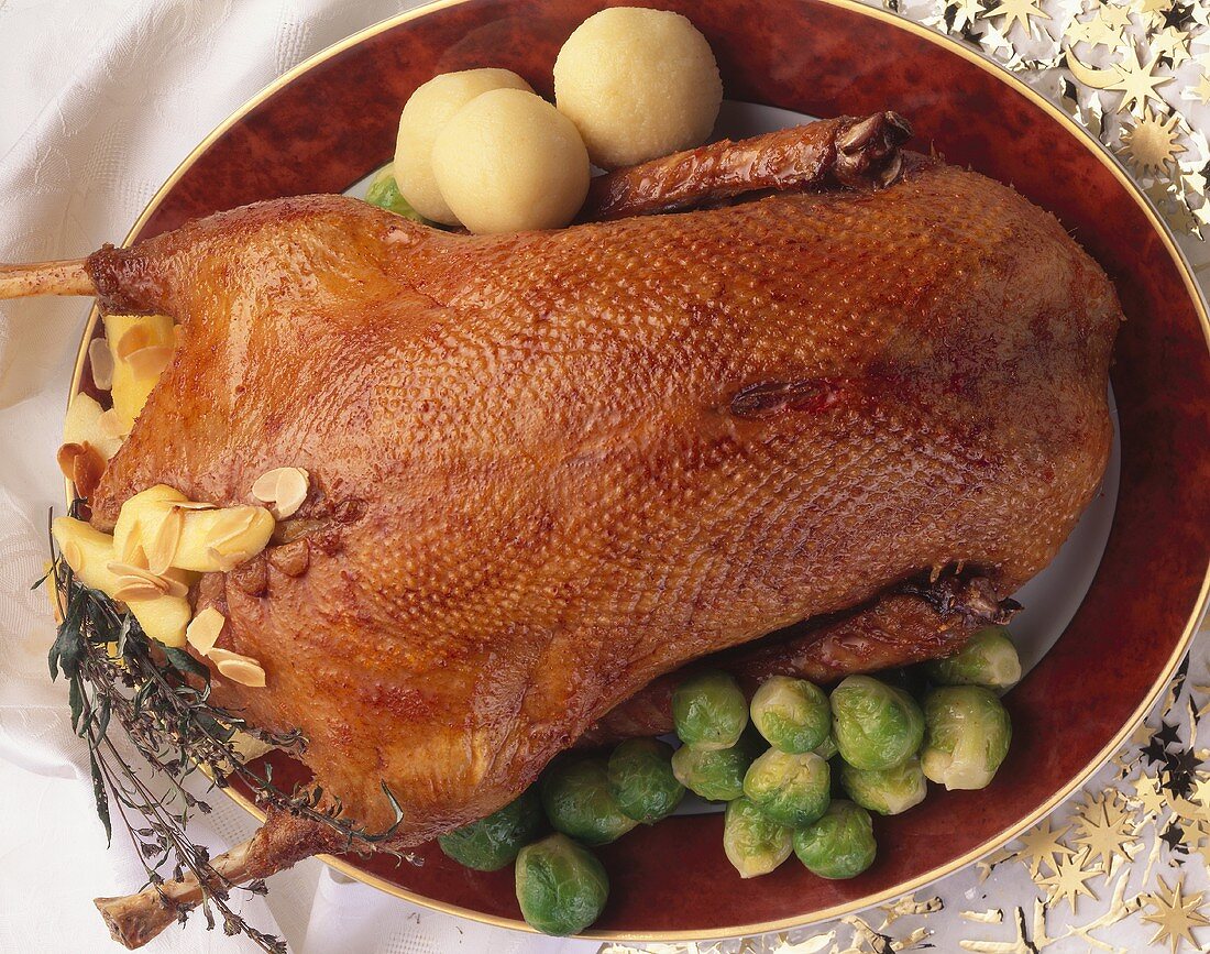 Stuffed Christmas goose with dumplings & Brussels sprouts