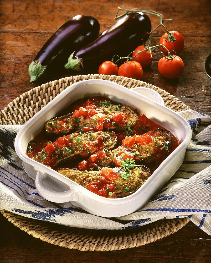 Aubergines with mince stuffing and tomato sauce