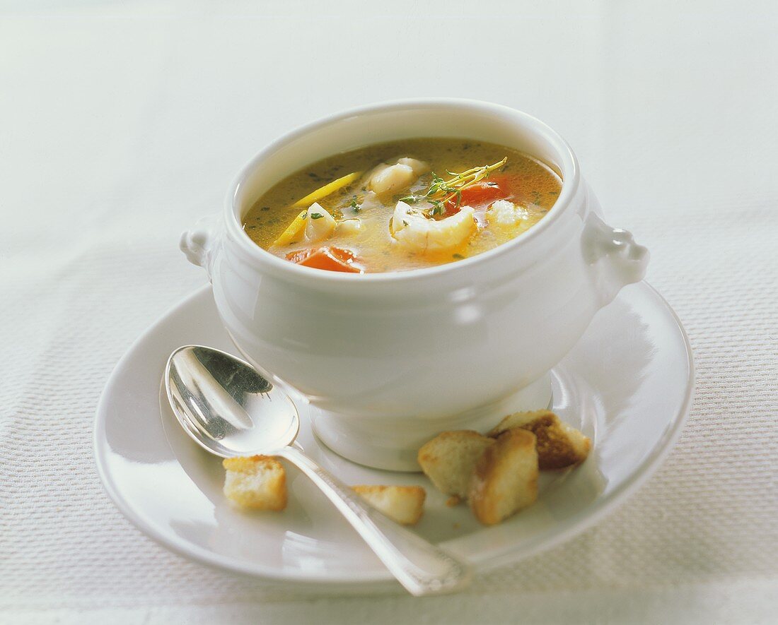 Bouillabaisse with potatoes and tomatoes