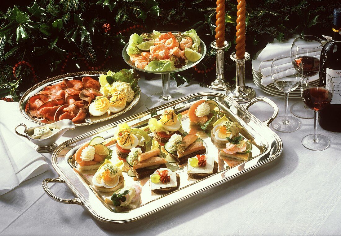 Appetiser buffet with canapes, roast beef and shrimps