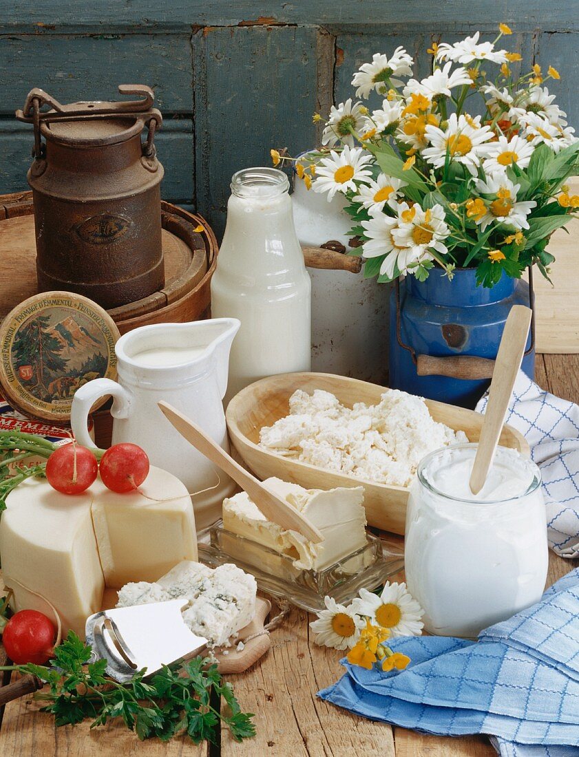 Still life with dairy products & a bunch of marguerites