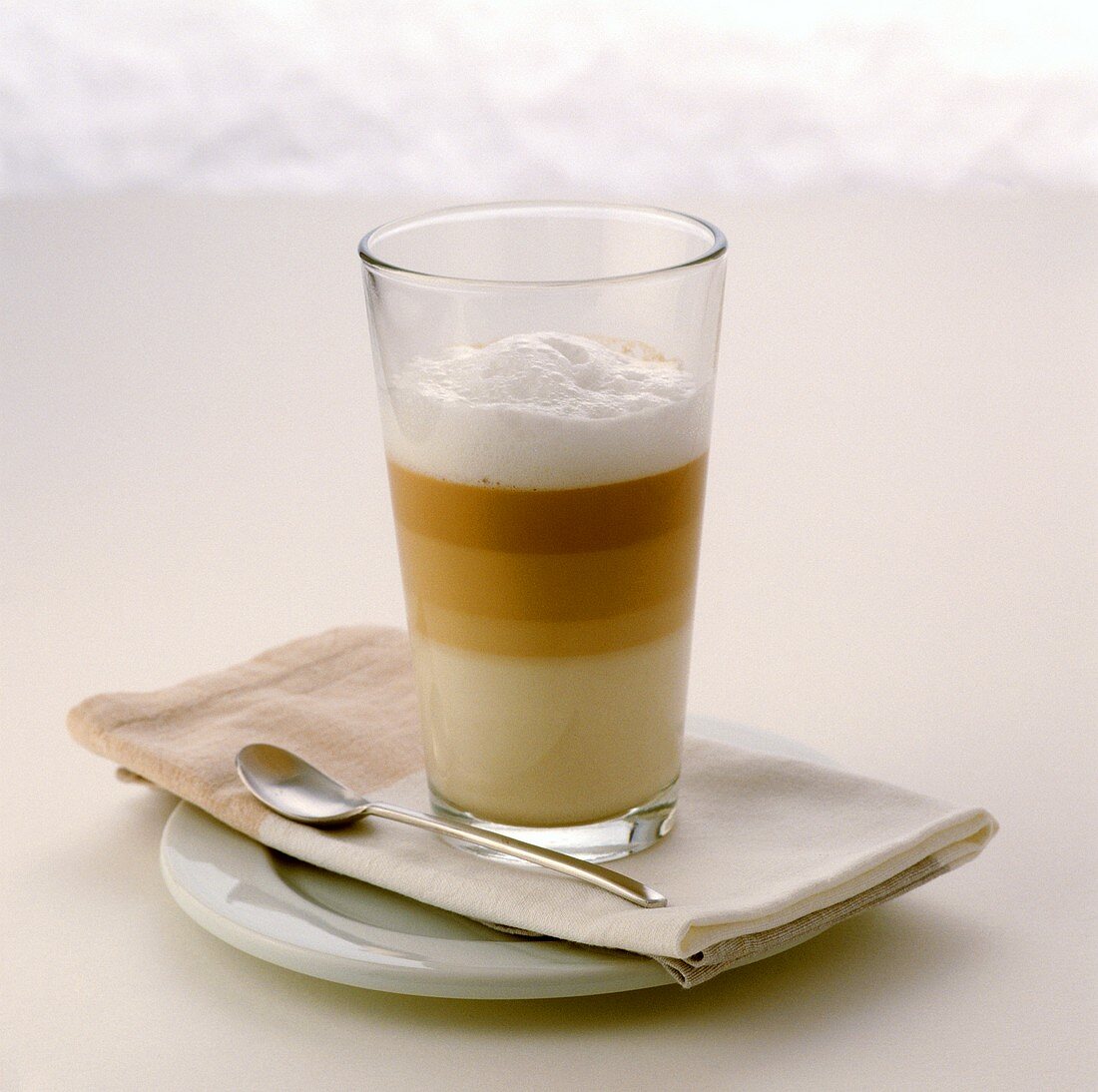 A glass of latte macchiato