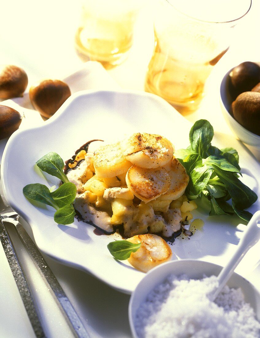 Pilgrim scallops with potatoes on chestnut sauce