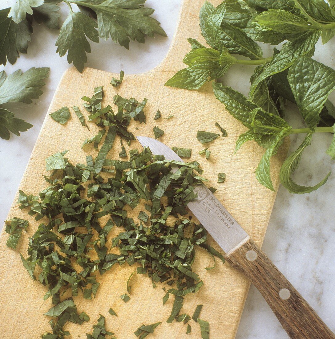 Finely chopping herbs