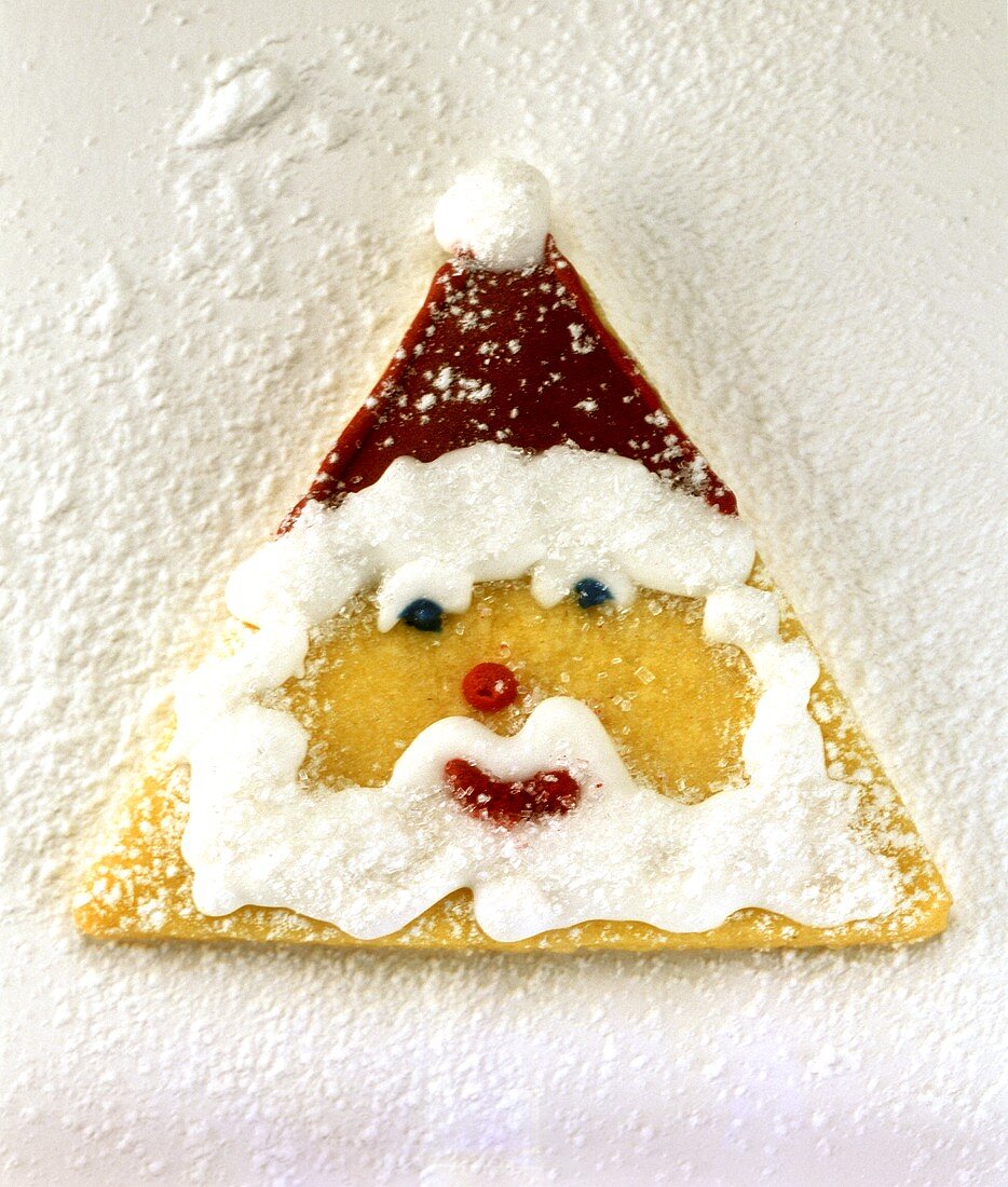 Baked Father Christmas face with coloured icing