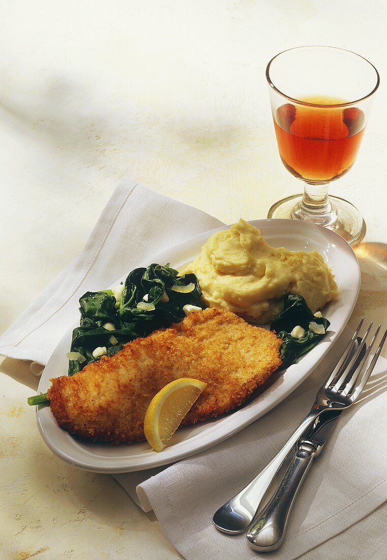Veal escalope with parmesan crust, spinach & mashed potato
