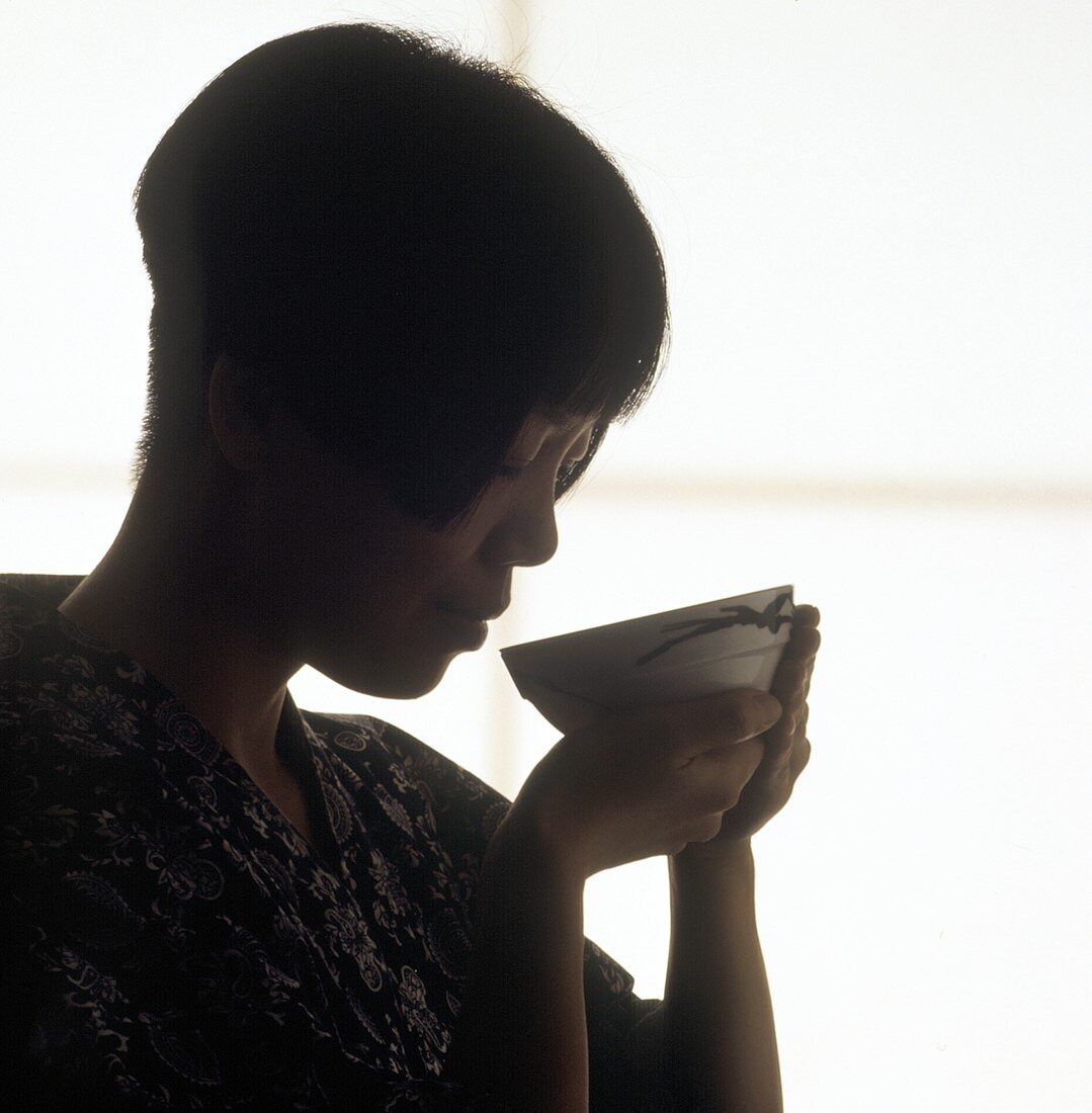 Woman Enjoying Tea