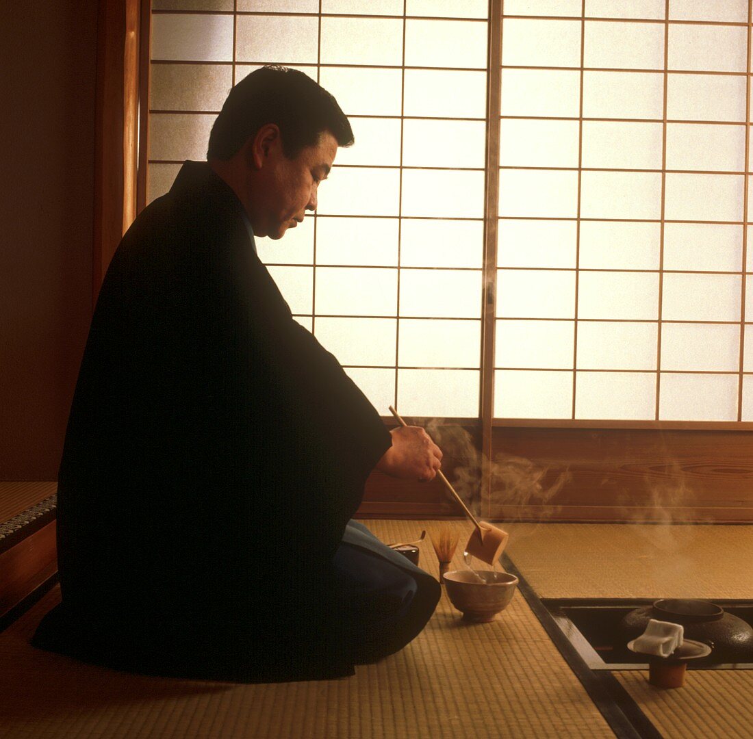 A Japanese man at a tea ceremony