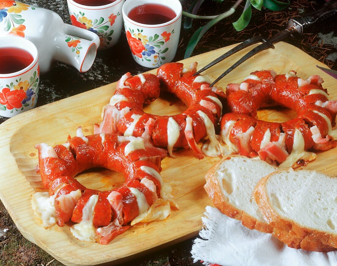Fried sausage rings larded with cheese