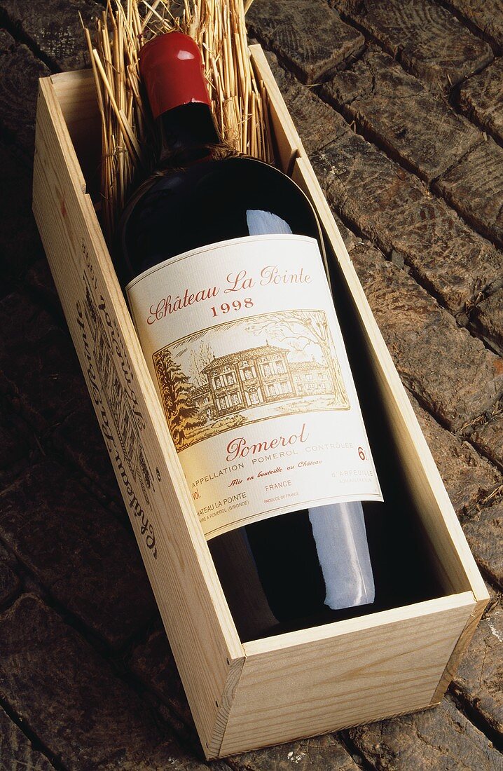 A bottle of 1998 Chateau la Point in wooden crate, Pomerol
