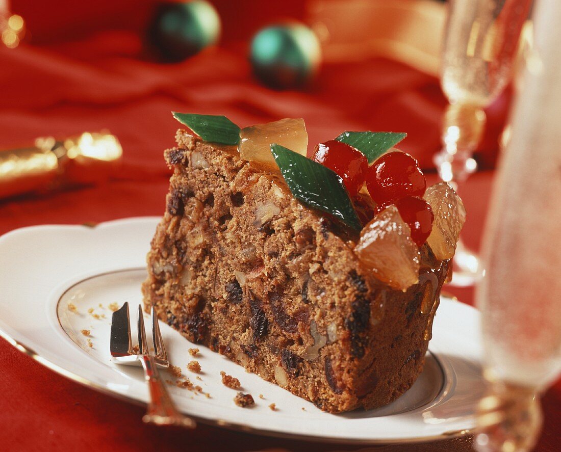 Piece of fruit cake with candied fruit for Christmas