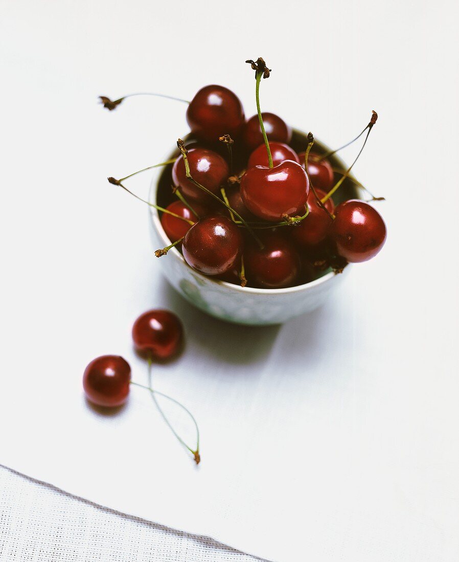 Several Red Cherries in Bowl