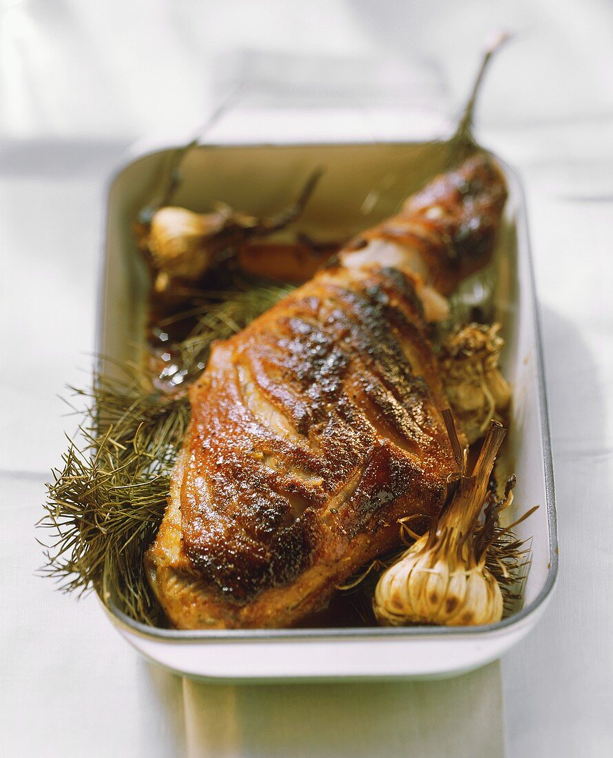 Majorcan leg of suckling pig with garlic and rosemary