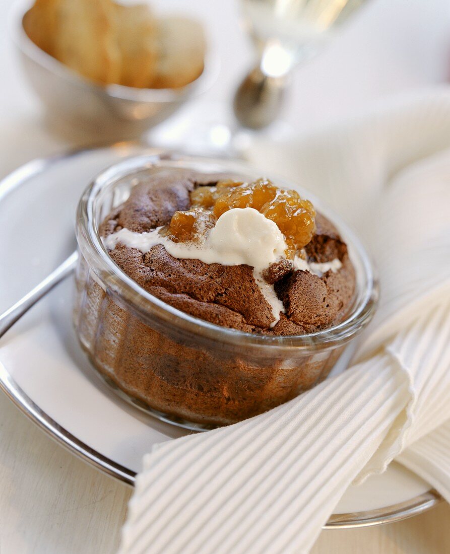 Chocolate souffle with jam and ice cream