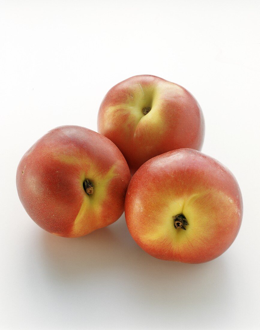 Three Nectarines