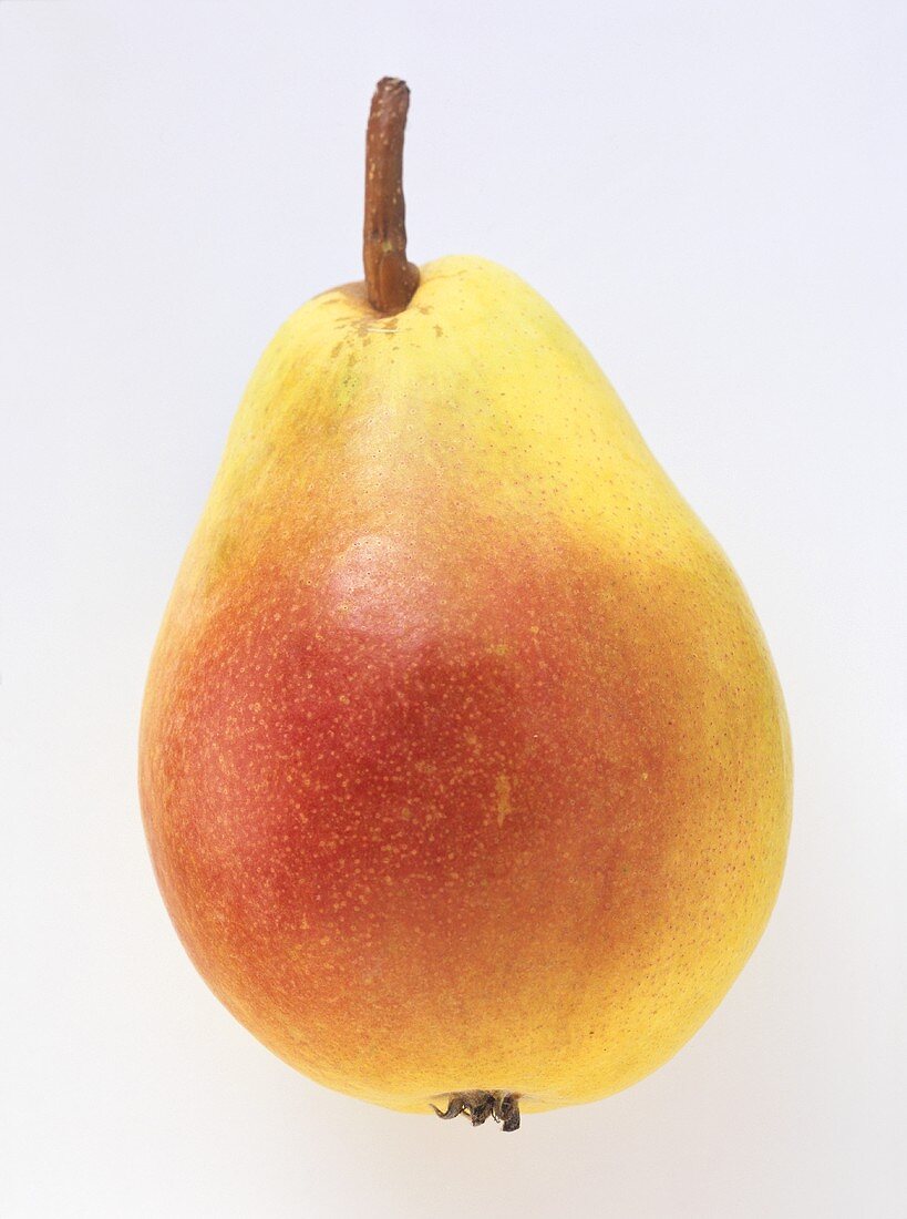 A yellow and red Santa Maria pear
