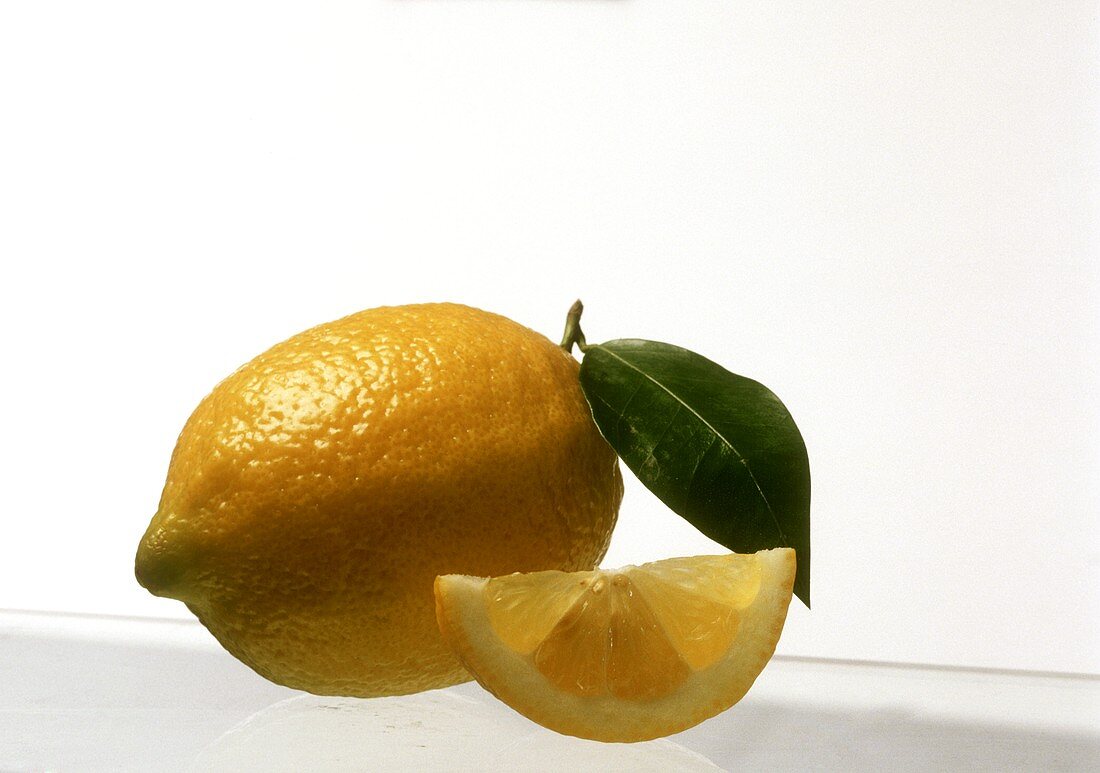 A lemon and a slice of lemon