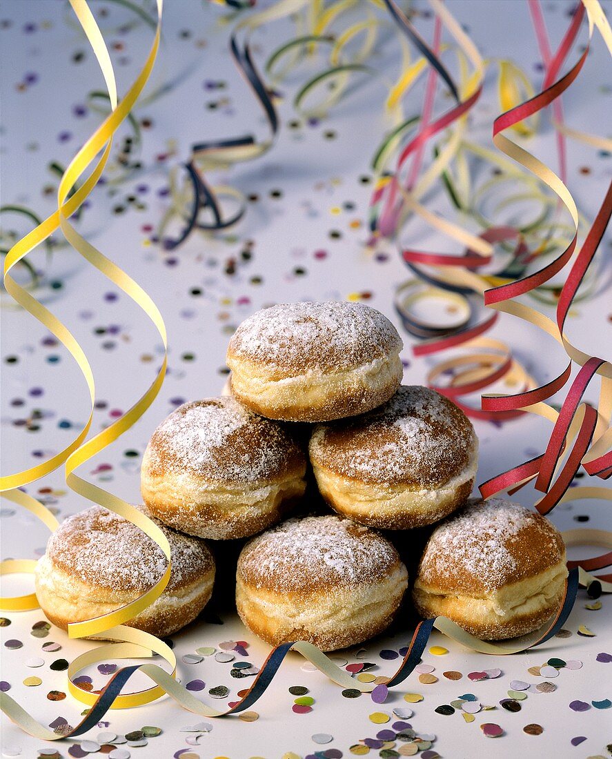 Carnival fritters surrounded by paper streamers