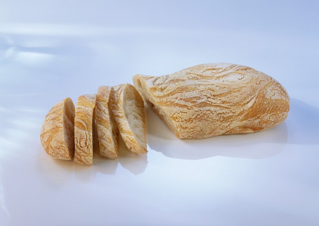 Ciabatta, a loaf and slices