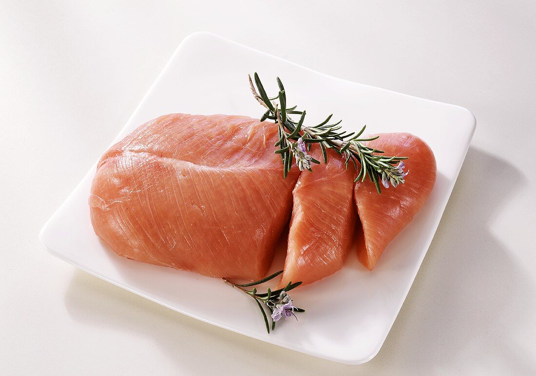 Turkey meat garnished with rosemary
