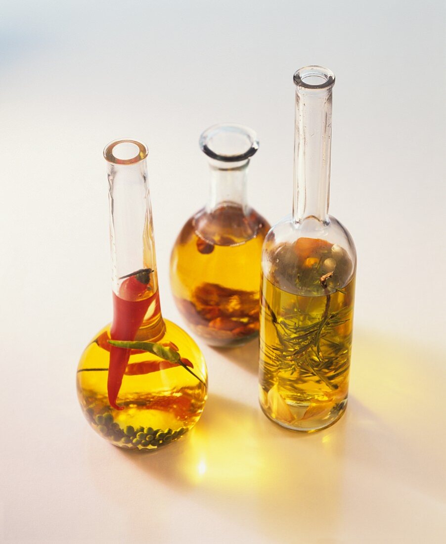 Oils with rosemary, chili and pepper