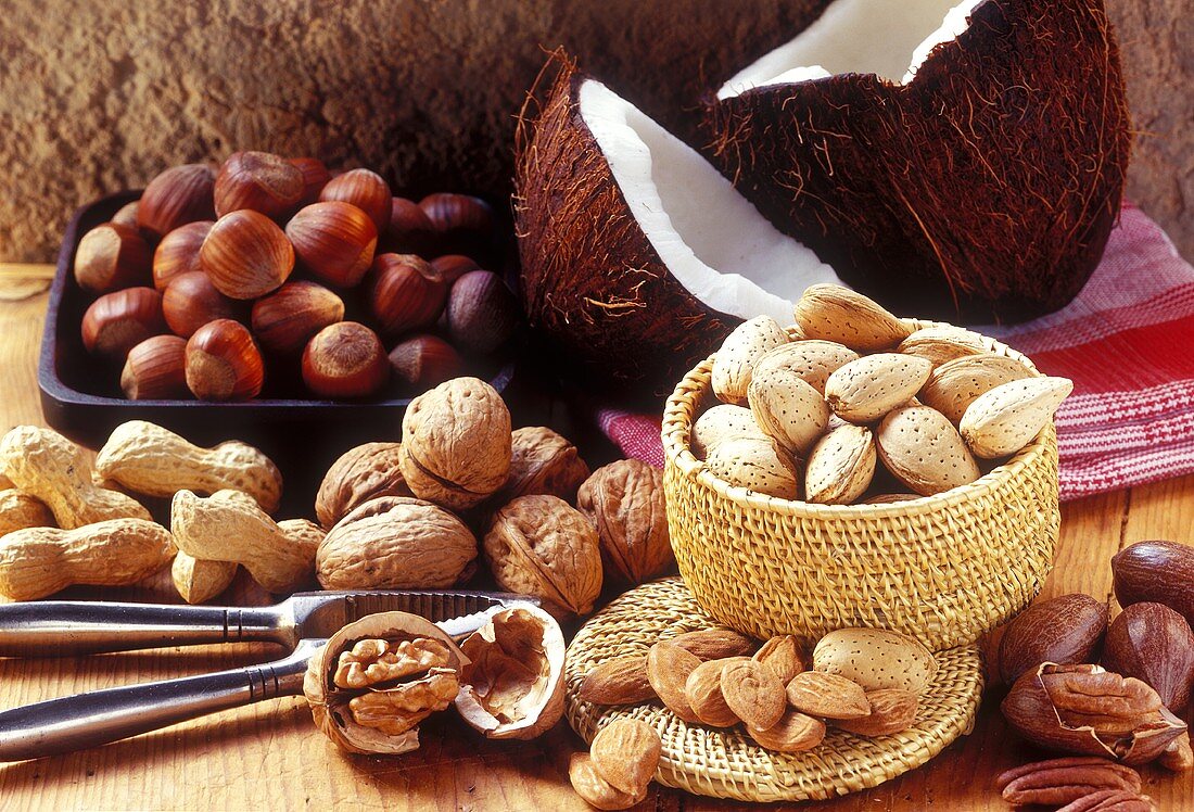 Still life with various nuts and a nutcracker