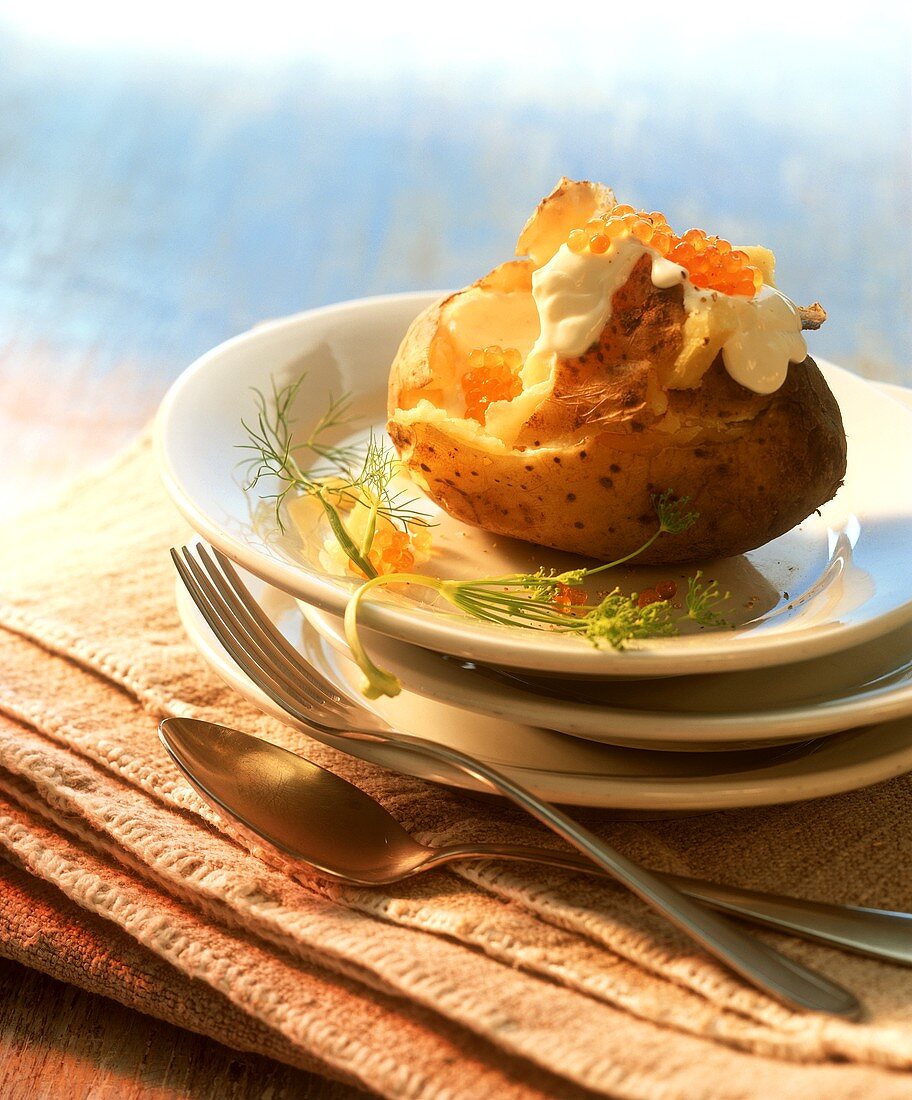 Baked potato with crème fraiche and caviare