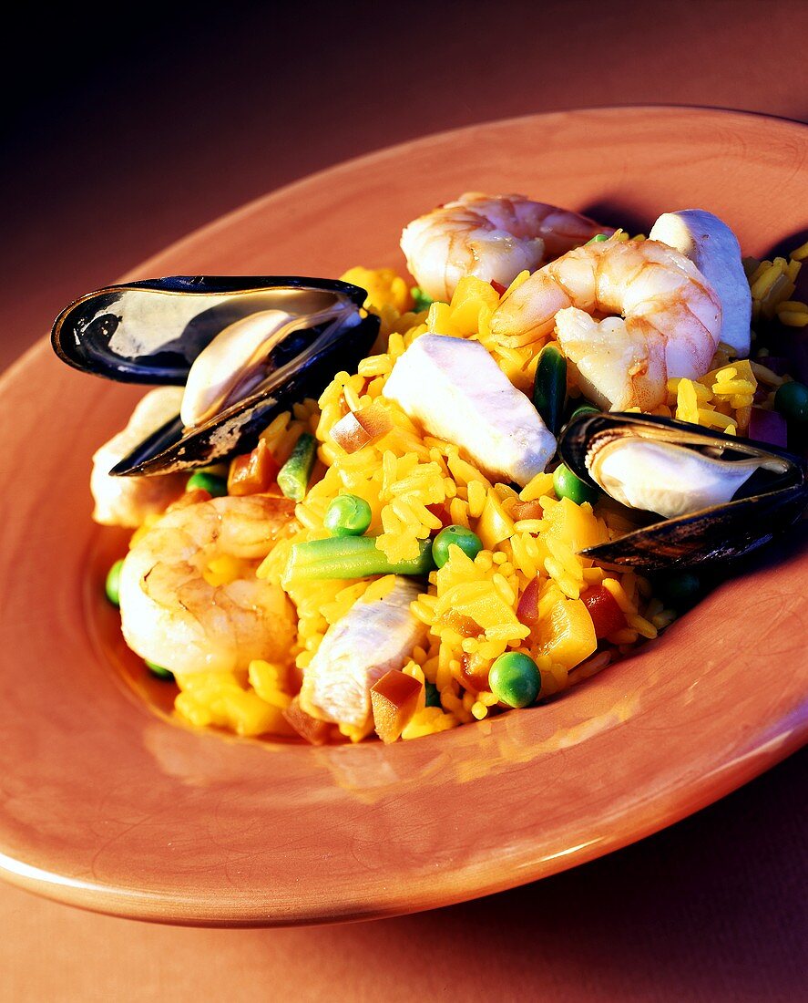 Paella with seafood and vegetables