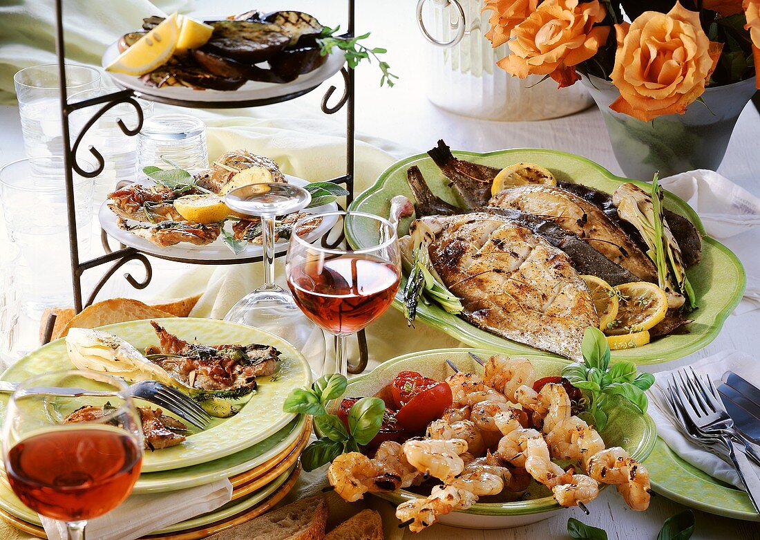 Italian buffet with scampi kebabs and grilled sole