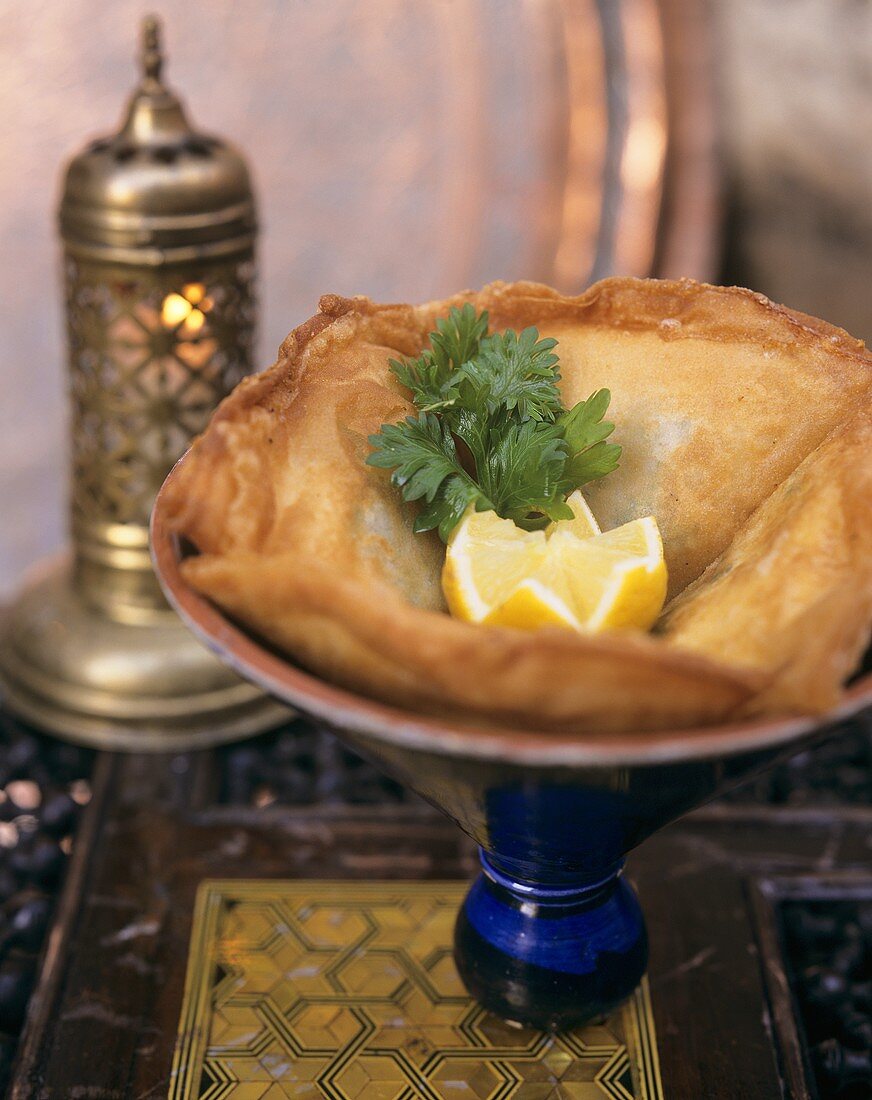 Brik à l'oeuf (Tunisian pastries) with tuna & egg filling